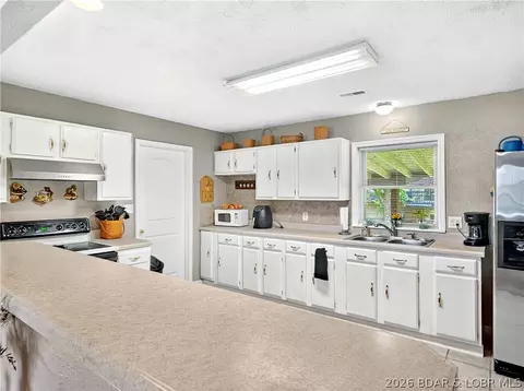 Kitchen - 705 Haven Dr, Eldon, MO 65026 photo 2 of 5