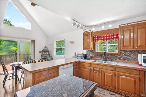 Kitchen - 1216 Robin Hood Ln, Roach, MO 65787 photo 3 of 3