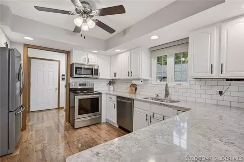 Kitchen - 347 Kona Cv, Roach, MO 65787 photo 2 of 5