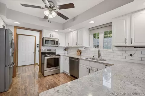Kitchen - 347 Kona Cv, Roach, MO 65787 photo 2 of 5