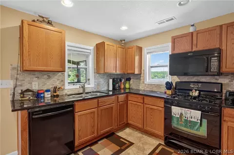 Kitchen - 29391 Zeus Dr, Edwards, MO 65326 photo 2 of 3