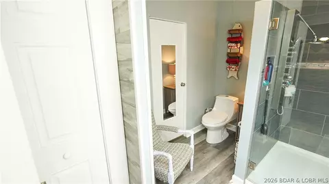 Bath - 99 Rustic Woods Rd, Sunrise Beach, MO 65079 photo 2 of 5