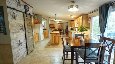Dining - 99 Rustic Woods Rd, Sunrise Beach, MO 65079 photo 2 of 2