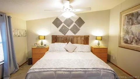 Bedroom - 99 Rustic Woods Rd, Sunrise Beach, MO 65079 photo 1 of 3