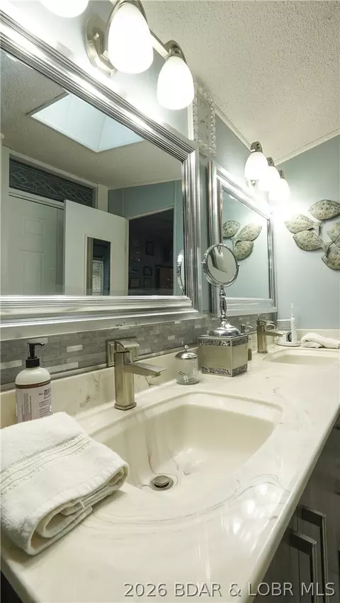 Bath - 99 Rustic Woods Rd, Sunrise Beach, MO 65079 photo 4 of 5