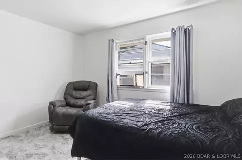 Bedroom - 509 Brockman Ave, Eldon, MO 65026 photo 8 of 10