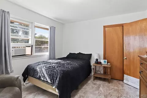 Bedroom - 509 Brockman Ave, Eldon, MO 65026 photo 9 of 10