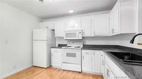 Kitchen - 421 Prestige Dr, Roach, MO 65787 photo 2 of 3