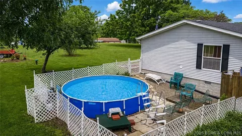Exterior - 1241 Cedar Ridge Cir, Roach, MO 65787 photo 4 of 8