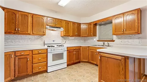 Kitchen - 1001 Colorado Ave, Eldon, MO 65026 photo 2 of 2