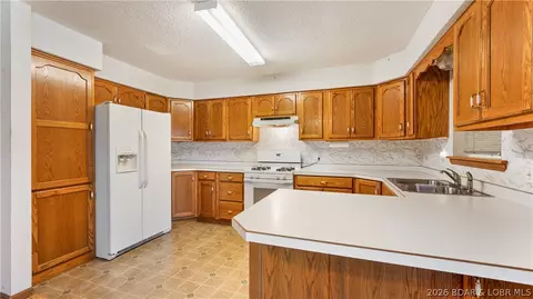 Kitchen - 1001 Colorado Ave, Eldon, MO 65026 photo 1 of 2