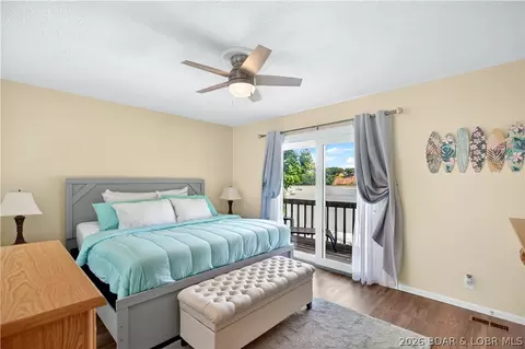 Bedroom - 104 Point Supreme Drive 112 Point Supreme Loop, Sunrise Beach, MO 65079 photo 1 of 7