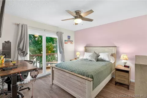 Bedroom - 104 Point Supreme Drive 112 Point Supreme Loop, Sunrise Beach, MO 65079 photo 3 of 7