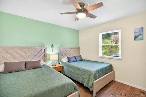Bedroom - 104 Point Supreme Drive 112 Point Supreme Loop, Sunrise Beach, MO 65079 photo 5 of 7
