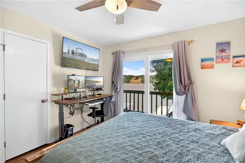 Bedroom - 104 Point Supreme Drive 112 Point Supreme Loop, Sunrise Beach, MO 65079 photo 4 of 7