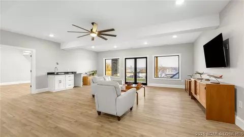 Living - 1254 Darwin Dr, Osage Beach, MO 65065 photo 8 of 10
