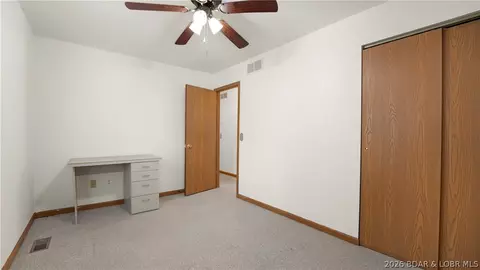 Bedroom - 401 Christopher Dr, Camdenton, MO 65020 photo 3 of 6