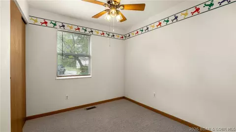Bedroom - 401 Christopher Dr, Camdenton, MO 65020 photo 4 of 6