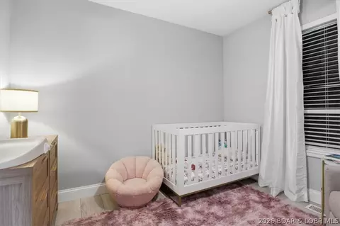 Bedroom - 158 Apache Rd, Four Seasons, MO 65049 photo 4 of 16