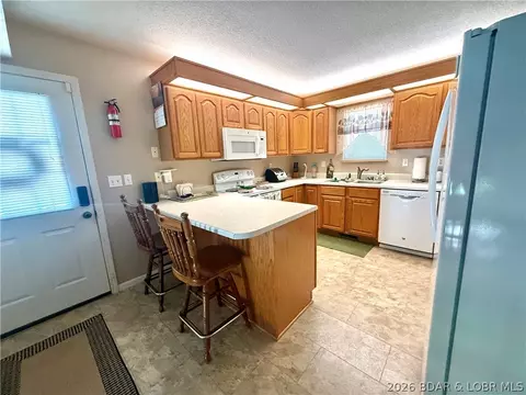Kitchen - 61 Leisure Rd, Eldon, MO 65026 photo 2 of 3