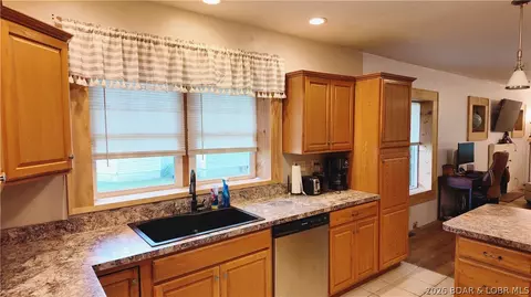 Kitchen - 205 S Grand Ave, Eldon, MO 65026 photo 1 of 2