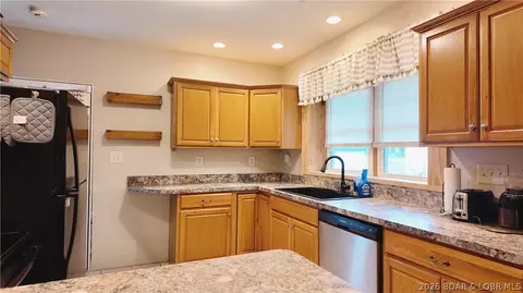 Kitchen - 205 S Grand Ave, Eldon, MO 65026 photo 2 of 2