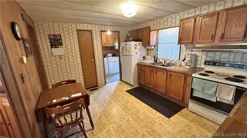 Kitchen - 796 SE 1051 Rd, Deepwater, MO 64740 photo 1 of 3