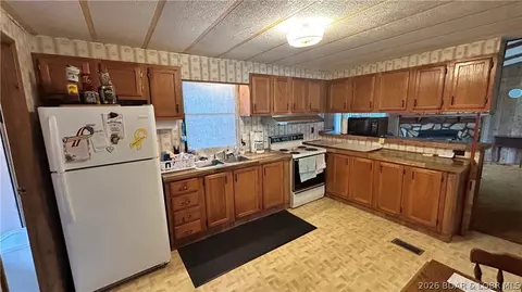 Kitchen - 796 SE 1051 Rd, Deepwater, MO 64740 photo 3 of 3