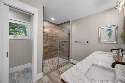Bath - 2437 Mohawk Ln, Osage Beach, MO 65065 photo 3 of 10