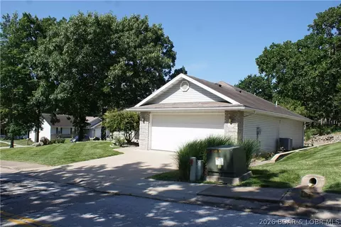 Exterior - 822 Maple Tree Cir, Osage Beach, MO 65065 photo 2 of 15