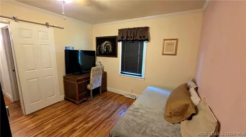 Bedroom - 301 N Hunter St, Versailles, MO 65084 photo 8 of 12