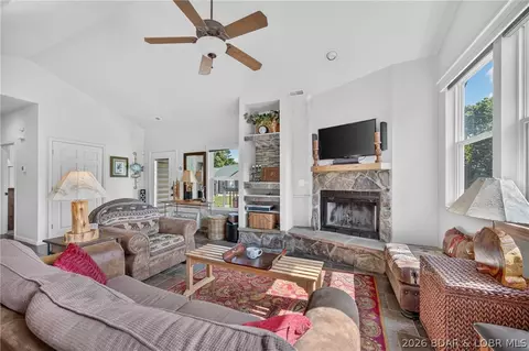 Living - 23 Cottage Park E Ct #22, Camdenton, MO 65020 photo 2 of 3