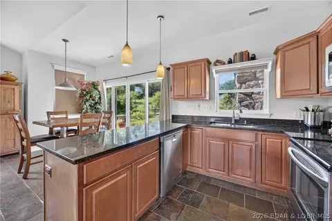 Kitchen - 23 Cottage Park E Ct #22, Camdenton, MO 65020 photo 2 of 2