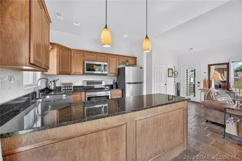 Kitchen - 23 Cottage Park E Ct #22, Camdenton, MO 65020 photo 1 of 2