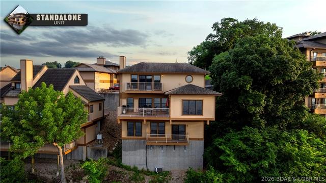 675 Cedar Rd #675, Lake Ozark, MO 65049