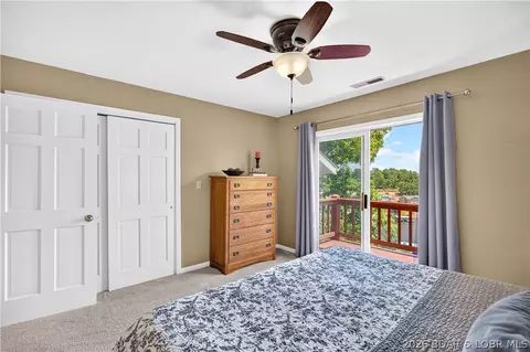 Bedroom - 973 Eagle Dr, Lake Ozark, MO 65049 photo 7 of 9
