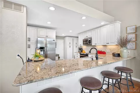 Kitchen - 973 Eagle Dr, Lake Ozark, MO 65049 photo 3 of 4