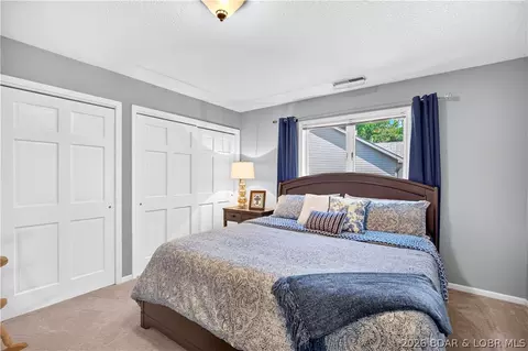 Bedroom - 973 Eagle Dr, Lake Ozark, MO 65049 photo 4 of 9