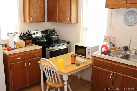 Kitchen - 516 S Burke St, Versailles, MO 65084 photo 2 of 4