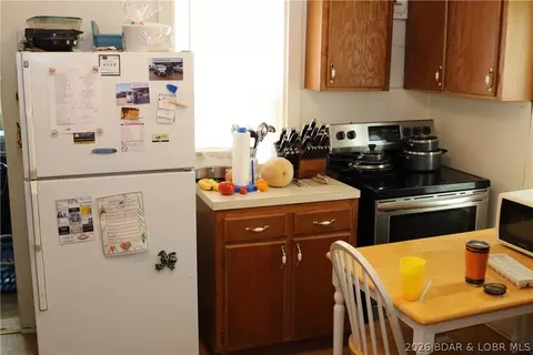 Kitchen - 516 S Burke St, Versailles, MO 65084 photo 3 of 4