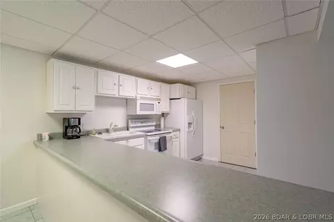Kitchen - 643 Heron Estates Dr, Camdenton, MO 65020 photo 6 of 7