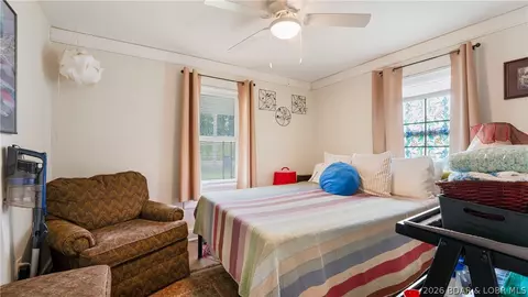 Bedroom - 309 E Main St, Richland, MO 65556 photo 2 of 3