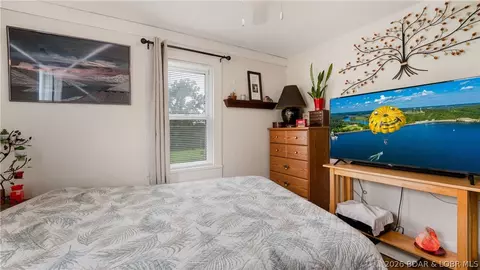 Bedroom - 309 E Main St, Richland, MO 65556 photo 1 of 3
