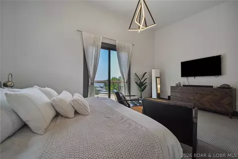 Bedroom - 626 Eagle Dr, Four Seasons, MO 65049 photo 2 of 9