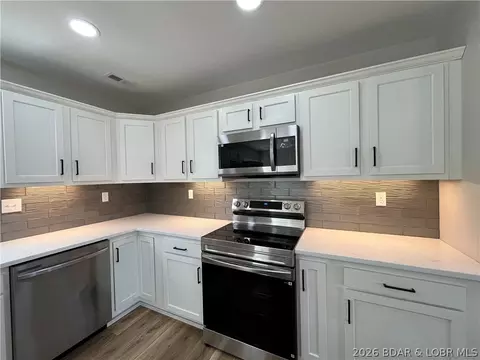 Kitchen - 602 Fourth St, Stover, MO 65078 photo 3 of 6