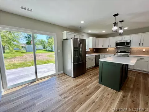 Kitchen - 602 Fourth St, Stover, MO 65078 photo 4 of 6