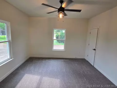 Bedroom - 604 Monroe St, Versailles, MO 65084 photo 2 of 9