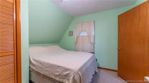 Bedroom - 32031 Aurora Rd, Stover, MO 65078 photo 2 of 4