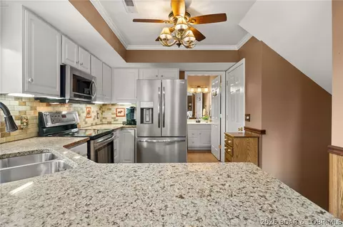 Kitchen - 1229 Pinewood Dr, Osage Beach, MO 65065 photo 3 of 3