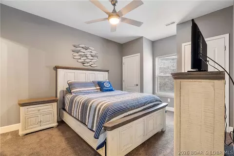 Bedroom - 100 Trinity Pointe Dr #3S, Camdenton, MO 65020 photo 4 of 8